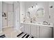 Bright main bathroom featuring tile flooring and a double sink vanity at 419 Farmwood Way, Canton, GA 30115