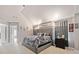Large main bedroom featuring elegant furnishings, wall art and light-filtering window shades at 419 Farmwood Way, Canton, GA 30115