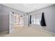 Bright office features French doors and a window with curtains at 419 Farmwood Way, Canton, GA 30115