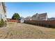 A view of the spacious backyard, fenced in for privacy at 4316 Constellation Blvd, Snellville, GA 30039