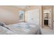 Cozy bedroom features neutral carpet, a double door closet, and an ensuite bath at 4316 Constellation Blvd, Snellville, GA 30039