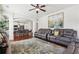 Bright living room showcasing a seamless transition to the dining area and kitchen, with elegant furnishings and decor at 4316 Constellation Blvd, Snellville, GA 30039