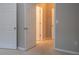 Bright hallway with three doors and neutral walls at 101 Spring Heights Se Ln # 1, Smyrna, GA 30080