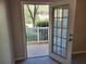 A door opens to a patio overlooking a lovely outdoor view at 101 Spring Heights Se Ln # 1, Smyrna, GA 30080