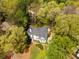 Aerial view of the home showcasing its mature landscaping and tree coverage at 129 Ridgetree Ln, Marietta, GA 30068