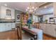 Spacious breakfast nook with a decorative chandelier, hardwood floors, and ample natural light at 129 Ridgetree Ln, Marietta, GA 30068