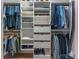 Well-organized closet featuring custom shelving, drawers, and hanging rods, providing efficient storage solutions at 129 Ridgetree Ln, Marietta, GA 30068