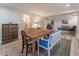 Dining area with a rustic wooden table and seating for six under recessed lighting at 129 Ridgetree Ln, Marietta, GA 30068