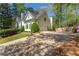 Spacious driveway leading to the side-entry garage of this charming home at 129 Ridgetree Ln, Marietta, GA 30068