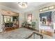 Spacious living room with hardwood floors, stylish seating, and seamless flow to other living spaces at 129 Ridgetree Ln, Marietta, GA 30068