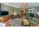 Bright living room with hardwood floors, large windows, and comfortable seating arrangements at 129 Ridgetree Ln, Marietta, GA 30068
