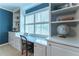 Bright office space with built-in shelving, desk, storage and a window letting in natural light at 129 Ridgetree Ln, Marietta, GA 30068