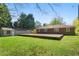 Sprawling backyard with single Gathering home and detached garage, offering ample space at 566 Huff St, Lawrenceville, GA 30046