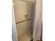 Clean, bright white tiled shower stall with grab bar and convenient built-in niche at 566 Huff St, Lawrenceville, GA 30046