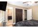 Comfortable bedroom with hardwood floors, natural lighting, and attached bathroom at 1302 Brittain Rd, Douglasville, GA 30134