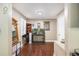 View of room featuring a bookshelf, a fish tank, and hardwood floors at 1302 Brittain Rd, Douglasville, GA 30134
