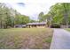 Well-kept home features a spacious front lawn and convenient carport at 284 Zion Wood Rd, Loganville, GA 30052