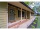 Charming front porch with decorative accents and manicured landscaping at 284 Zion Wood Rd, Loganville, GA 30052