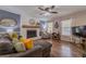 Cozy living room featuring a white-painted brick fireplace and stylish decor at 284 Zion Wood Rd, Loganville, GA 30052