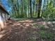 Large, wooded backyard with plenty of shade at 3347 Sir Lancelot Sw Pl, Marietta, GA 30008