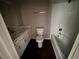 Cozy full bathroom featuring a vanity with sink and shower-tub combo at 3347 Sir Lancelot Sw Pl, Marietta, GA 30008