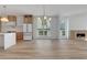 Modern kitchen with large island, stainless steel appliances, and bright, open living space at 644 Glendale Rd, Scottdale, GA 30079