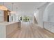 Beautiful kitchen with large island, modern lighting, and seamless flow into living spaces at 644 Glendale Rd, Scottdale, GA 30079
