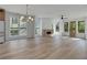 Spacious living area showcasing hardwood floors, modern fireplace, and natural light throughout at 644 Glendale Rd, Scottdale, GA 30079