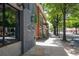 Picturesque downtown streetscape lined with sidewalks and charming brick buildings at 644 Glendale Rd, Scottdale, GA 30079