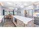 Stylish kitchen with a large center island, stainless steel appliances and lots of cabinet space at 860 Cramac Dr, Lawrenceville, GA 30046