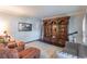 Comfortable living room featuring a large built-in bookshelf and comfortable seating at 860 Cramac Dr, Lawrenceville, GA 30046
