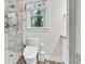 Contemporary bathroom featuring glass shower, and stylish fixtures at 1972 Tanglewood Dr, Snellville, GA 30078