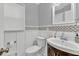 Stylish bathroom features a decorative wall, a modern vanity, and a new toilet at 1972 Tanglewood Dr, Snellville, GA 30078