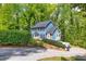 Charming two-story home with a well-maintained yard and driveway at 1972 Tanglewood Dr, Snellville, GA 30078