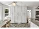 Bright kitchen boasts white cabinets, granite countertops, and a spacious layout at 1972 Tanglewood Dr, Snellville, GA 30078