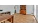 Home office featuring wood floors, plenty of light, and classic wood furniture at 1972 Tanglewood Dr, Snellville, GA 30078