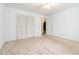 A light-filled bedroom with closet doors, providing ample storage space at 2343 Kings Point Dr, Dunwoody, GA 30338
