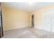 Sunny bedroom with a closet and open doorway, offering comfort and convenience at 2343 Kings Point Dr, Dunwoody, GA 30338