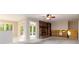 Open concept living room features a brick fireplace and views to the outside deck at 2343 Kings Point Dr, Dunwoody, GA 30338
