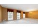 Bright living room with neutral carpet, tan walls, and classic chandelier at 2343 Kings Point Dr, Dunwoody, GA 30338