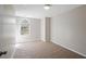 Neutral bedroom with a single window and tan carpet at 2979 Sweetbriar Walk, Snellville, GA 30039