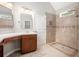 Beautiful bathroom with walk-in shower, modern tile, and elegant vanity at 4960 Shannon Sw Way, Mableton, GA 30126