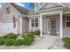 Charming single-story home with attached garage and well-manicured landscaping around the front porch at 4960 Shannon Sw Way, Mableton, GA 30126