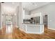 Modern kitchen featuring granite countertops, stainless steel appliances, and ample cabinet space in an open-concept design at 4960 Shannon Sw Way, Mableton, GA 30126