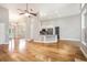 Modern kitchen featuring stainless steel appliances and granite countertops with a hardwood floor at 4960 Shannon Sw Way, Mableton, GA 30126