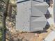 A high angle aerial view showcases the property's roof, backyard, and street access at 1041 Cherryfield Run, Marietta, GA 30008