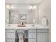 Bathroom featuring dual sinks, vanity and ample lighting at 1041 Cherryfield Run, Marietta, GA 30008