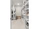 Walk-in closet with ample shelving and drawers for optimal organization at 1041 Cherryfield Run, Marietta, GA 30008