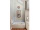 Bathroom close-up with soaking tub featuring marble surround and stylish fixtures at 1061 Arbor Ne Trce, Atlanta, GA 30319