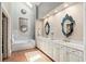 Spacious bathroom with soaking tub, double vanity, and recessed lighting at 1061 Arbor Ne Trce, Atlanta, GA 30319